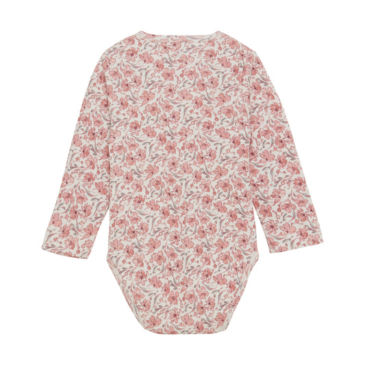 Flat back product image of an ivory baby bodysuit with a bright floral print
