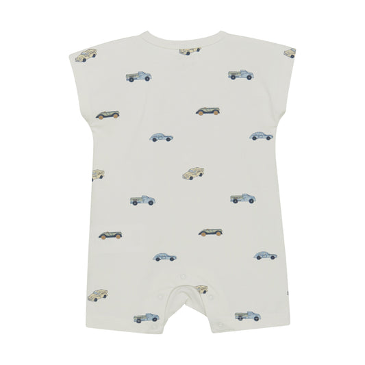 Flat back product image of ivory baby playsuit with car print