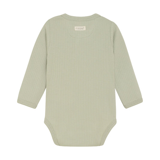 Flat back product image of a long sleeve wrap front baby bodysuit in soft green