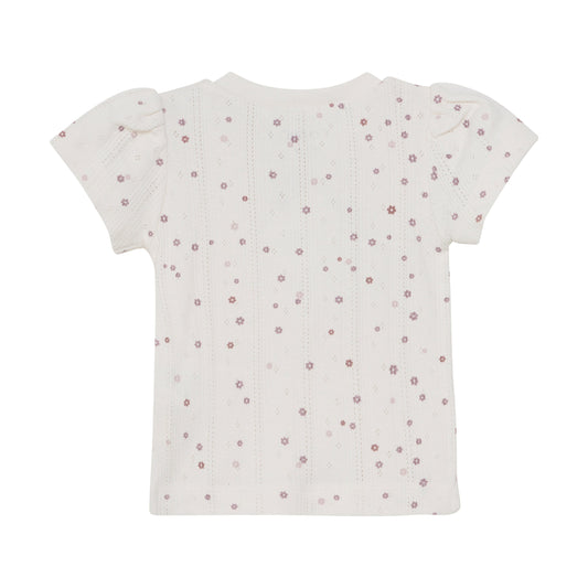 Flat back product image of an ivory pointelle baby tee with a purple daisy print