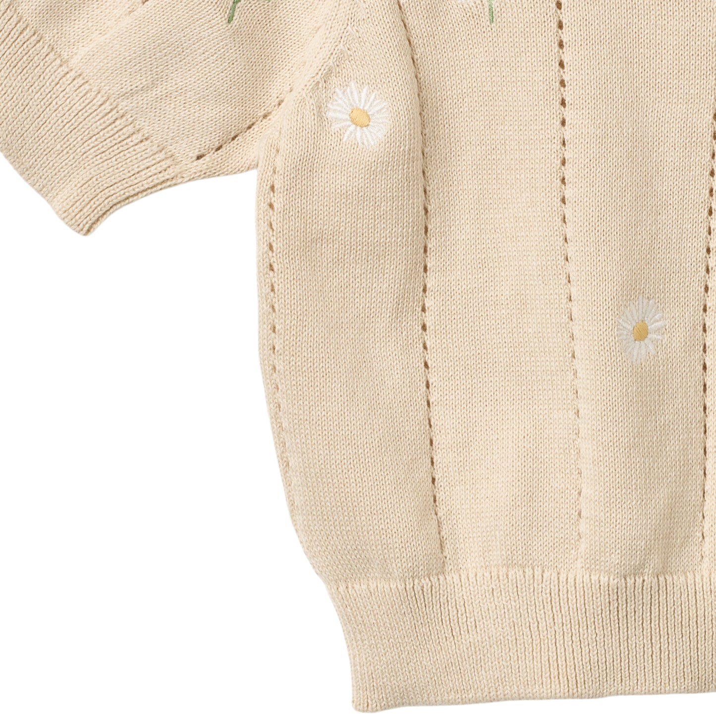 Close up product image of pale yellow knit baby top