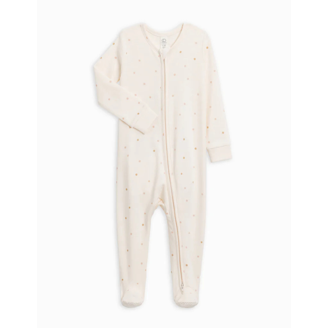 Product image of an ivory zippered sleeper with a polka dot print