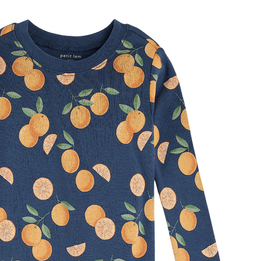 close up pattern detail of an orange print on a navy background