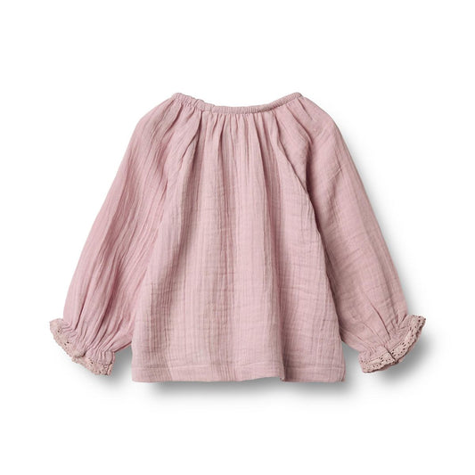 Flat back product image of a long sleeve cotton muslin blouse