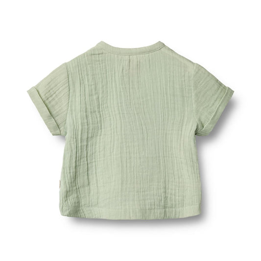 Flat back product image of a woven relaxed fit baby shirt