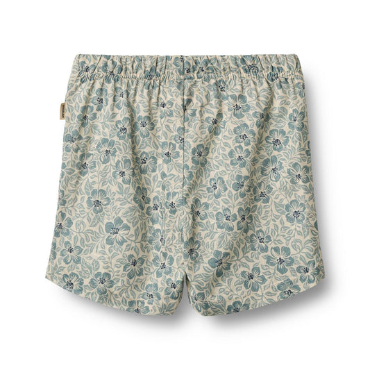 Flat back product image of hawaiian print baby shorts