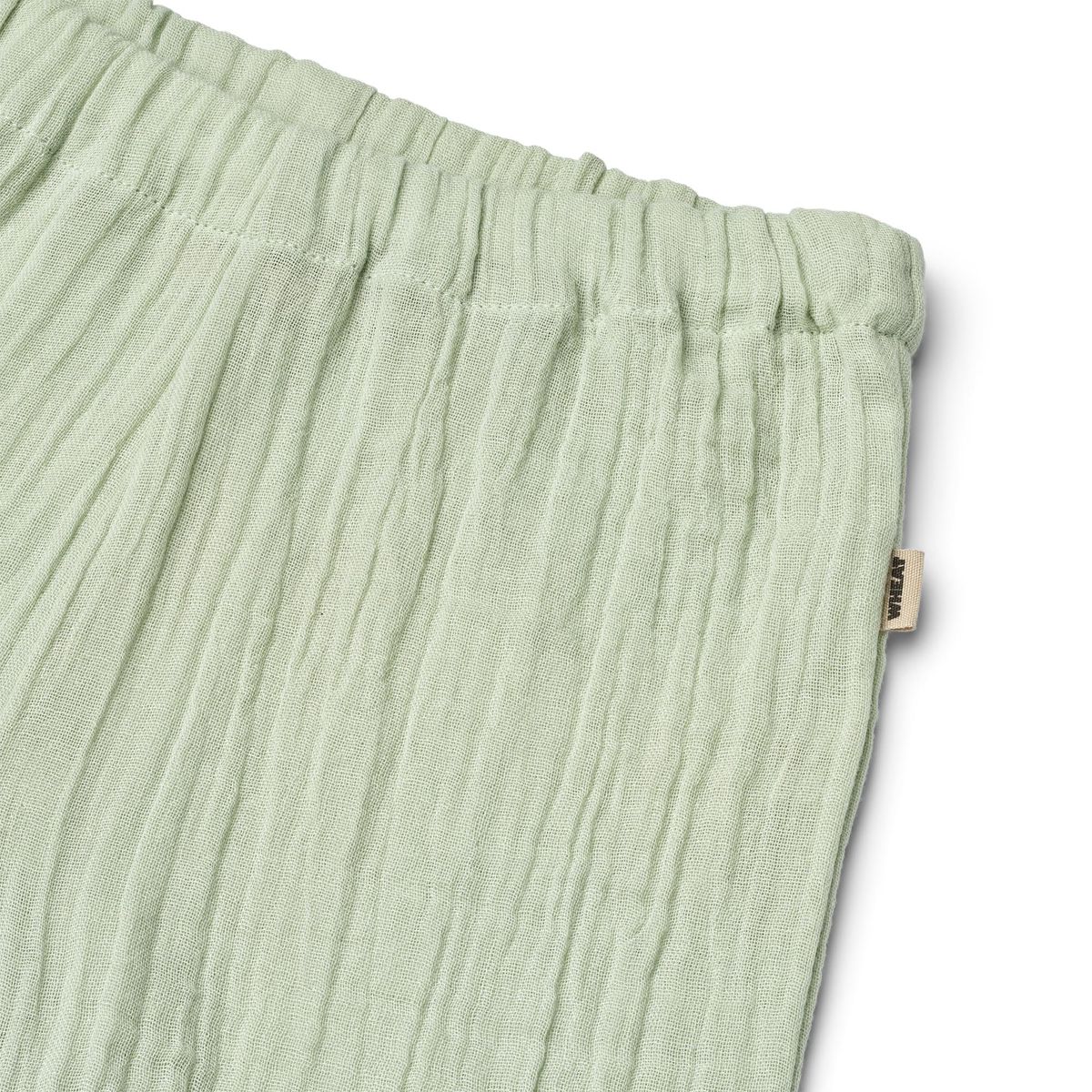 Close up product image of woven relaxed fit baby shorts
