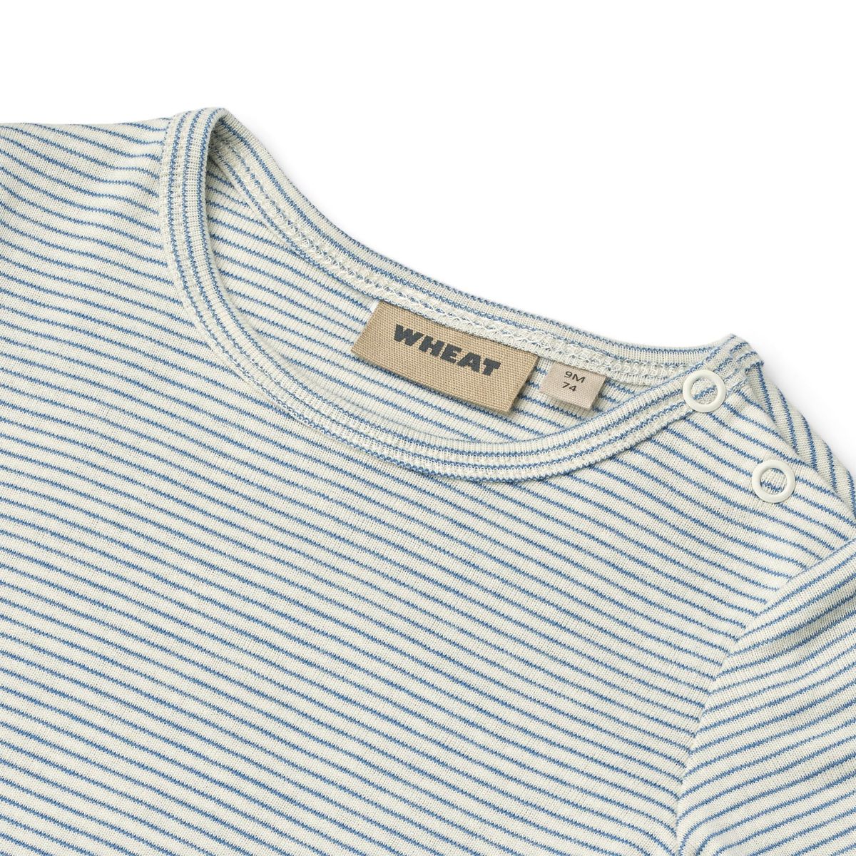 Close up product image of a short sleeve baby bodysuit