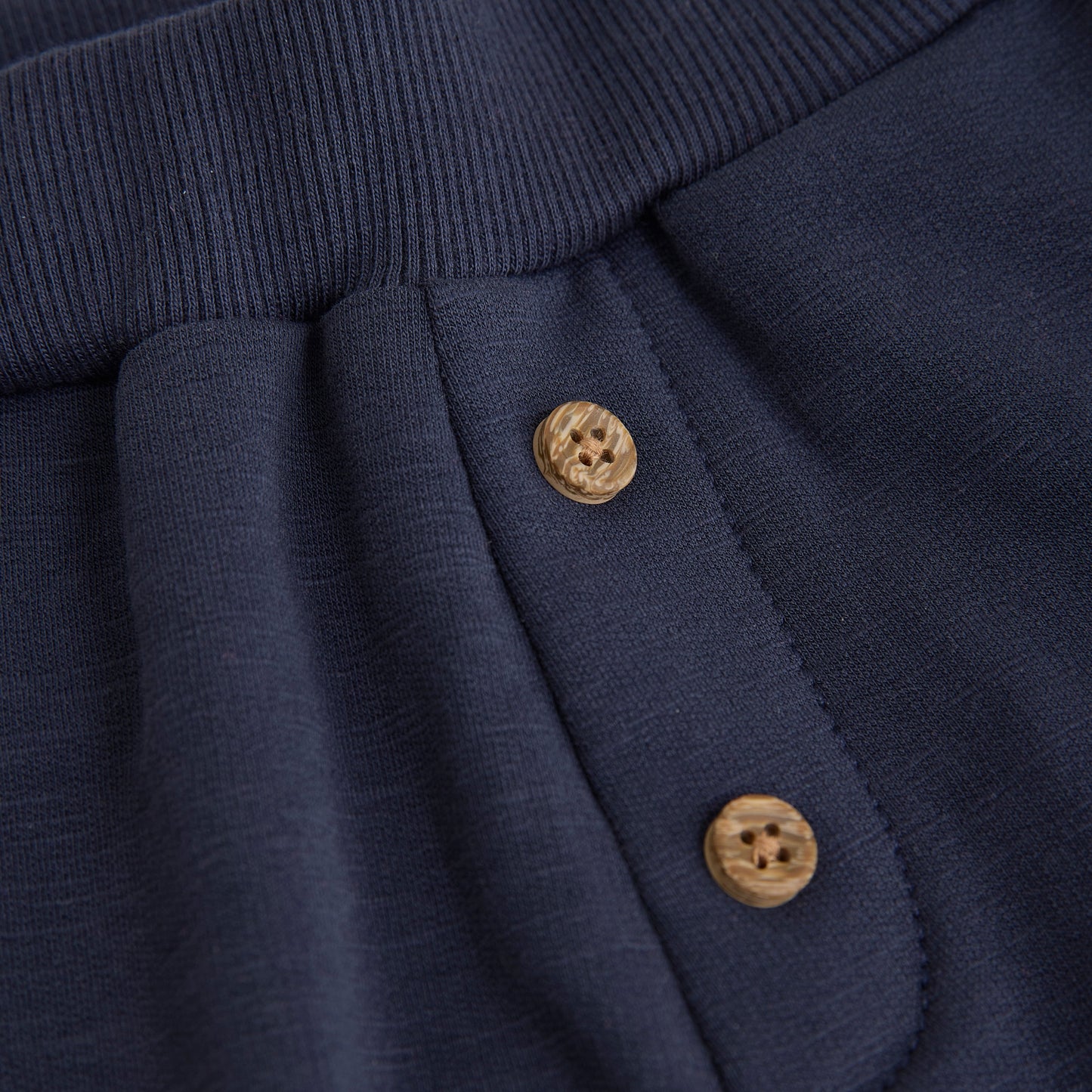Close up product image of navy baby sweatpants