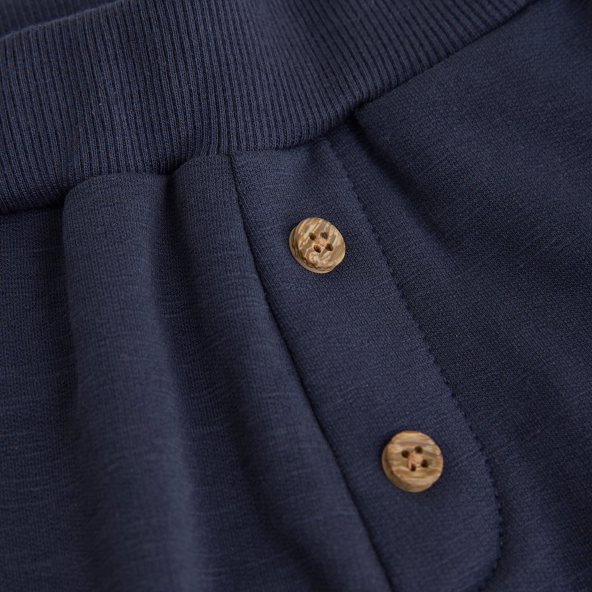 Close up product image of navy baby sweatpants