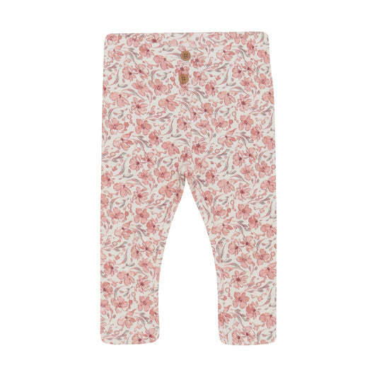Flat front product image of ivory baby leggings with a bright floral print