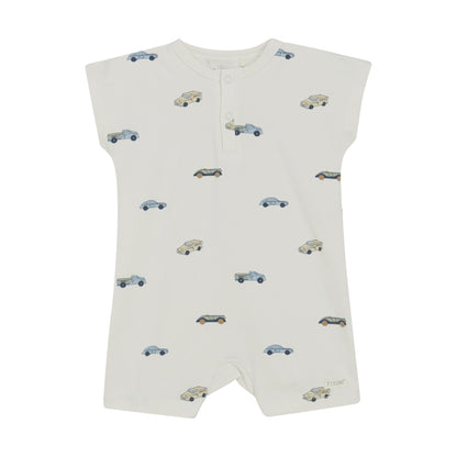 Flat front product image of ivory baby playsuit with car print