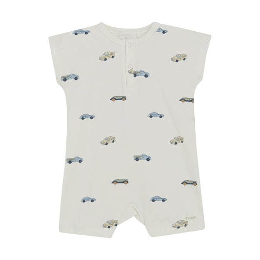 Flat front product image of ivory baby playsuit with car print