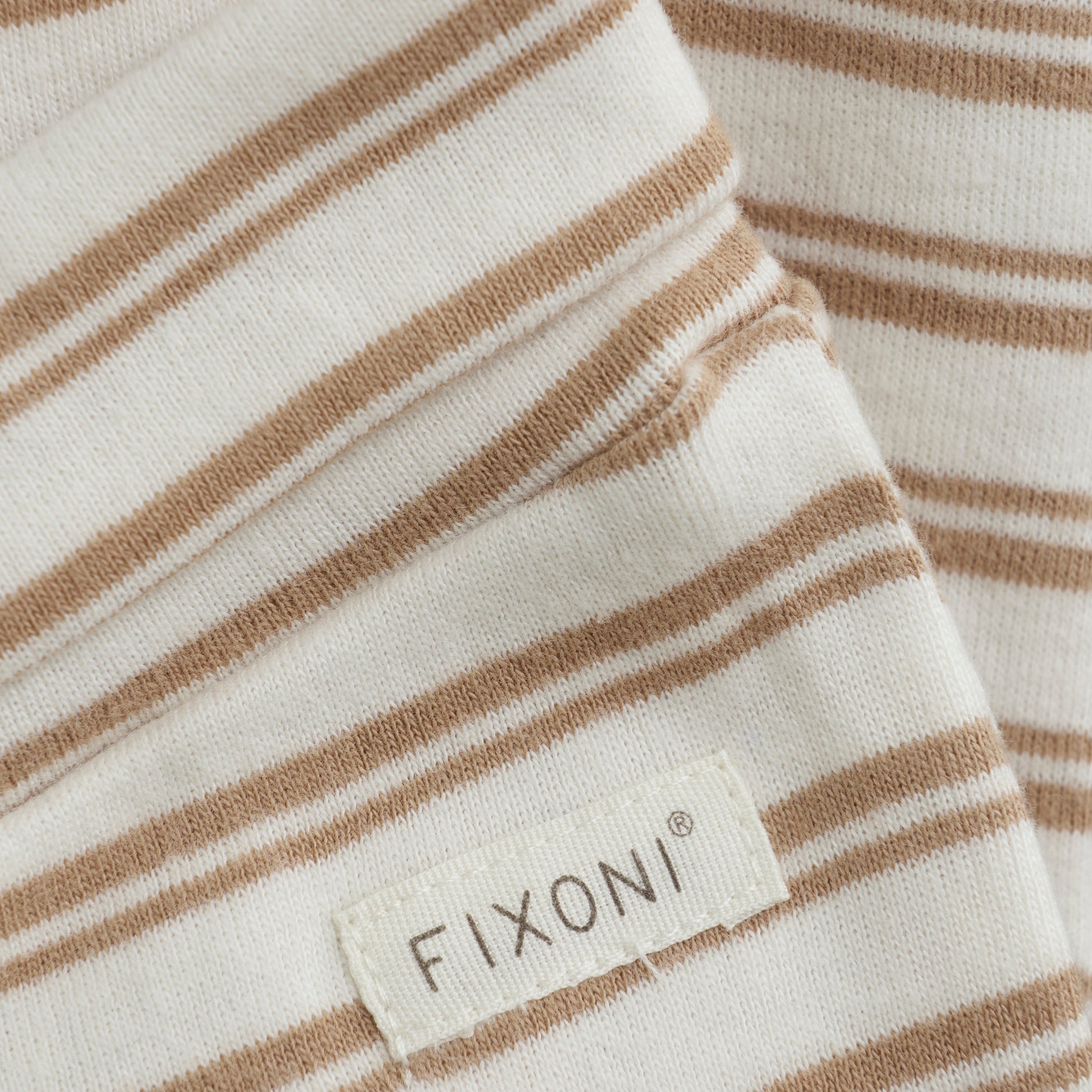 Close up product image of footed baby leggings
