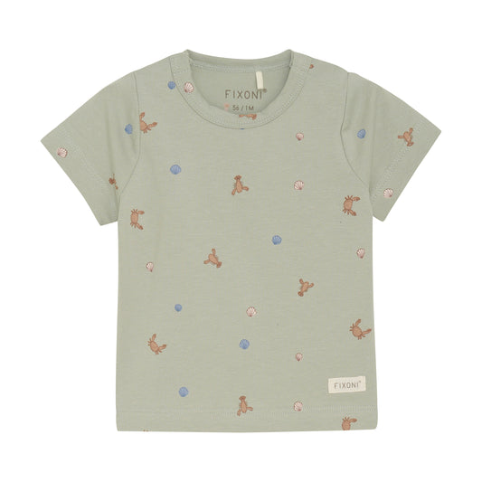 Flat front product image of a short sleeve tee with a green desert print