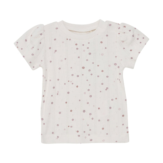 Flat front product image of an ivory pointelle baby tee with a purple daisy print
