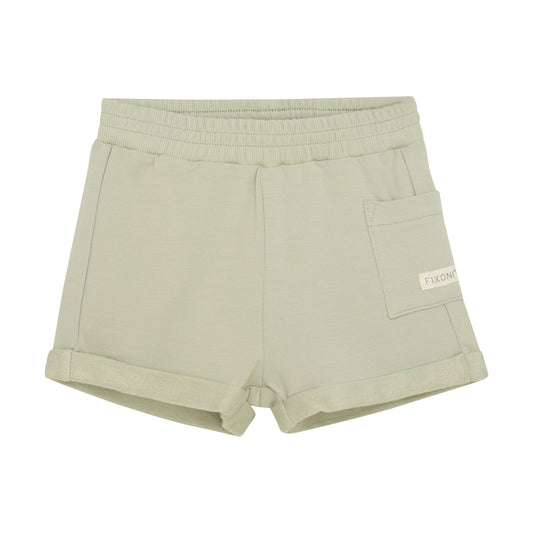 Flat front product image of light green baby sweat shorts