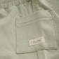 Close up product image of light green baby sweat shorts