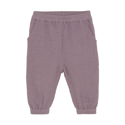 Flat front product image of woven baby trousers in purple