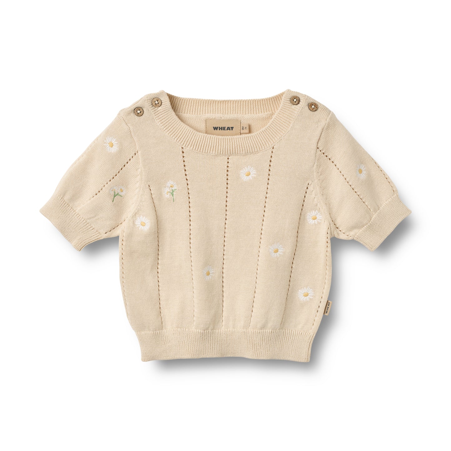 Flat front product image of pale yellow knit baby top