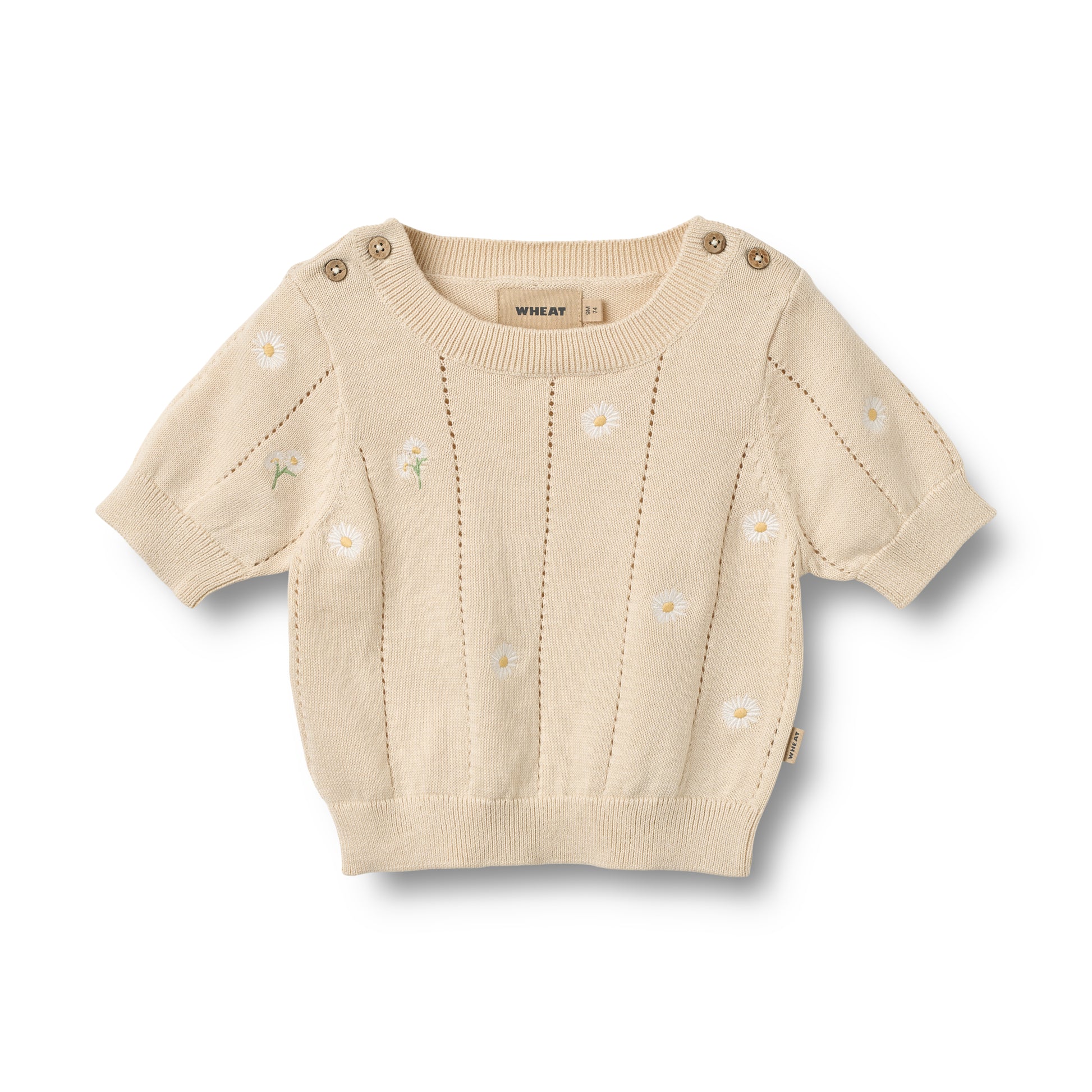 Flat front product image of pale yellow knit baby top