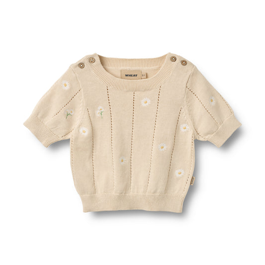 Flat front product image of pale yellow knit baby top