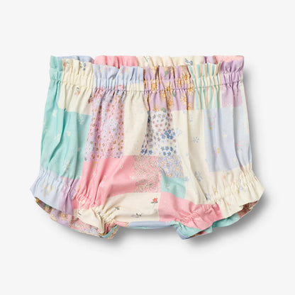 Flat front product image of patchwork baby shorts