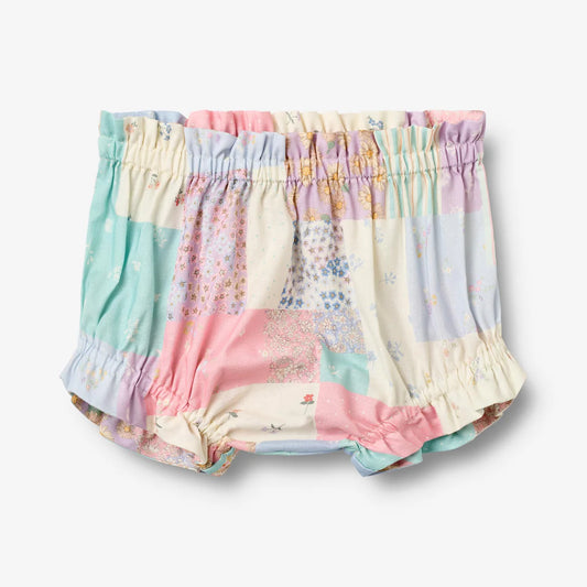 Flat front product image of patchwork baby shorts