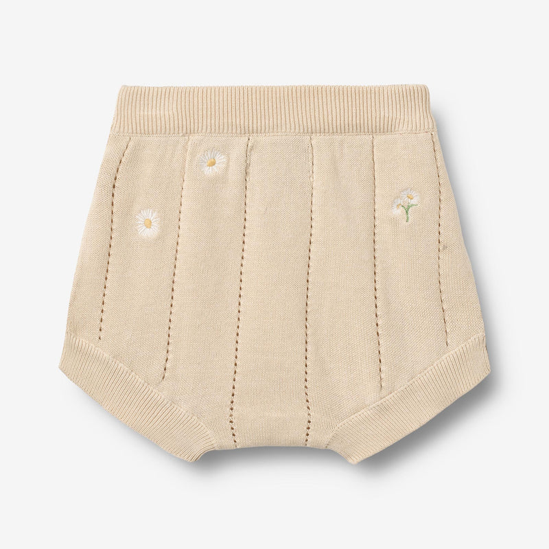 Flat back product image of pale yellow knit baby shorts