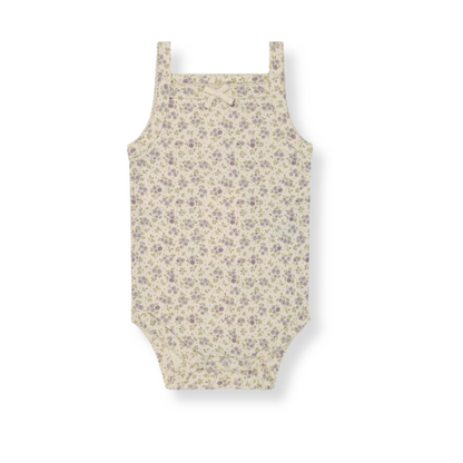 flat lay of a baby singlet bodysuit with a floral pattern