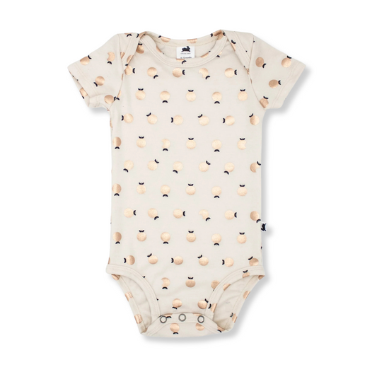 Product image of a short sleeve baby onesie in ivory with a shiny apple all-over print
