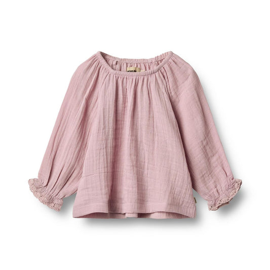 Flat front product image of a long sleeve cotton muslin blouse