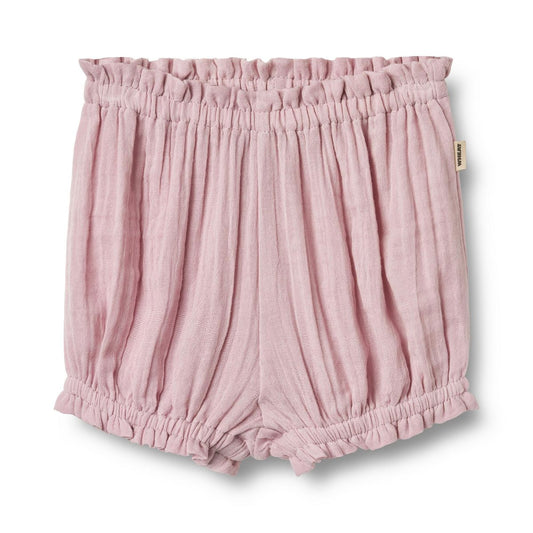 Flat front product image of cotton muslin baby bloomer shorts