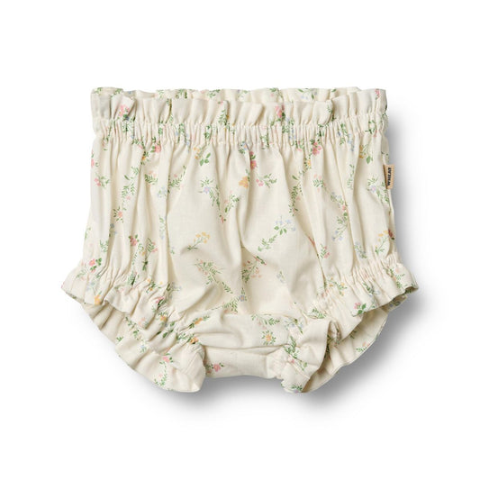 Flat front product image of woven cotton baby bloomer shorts