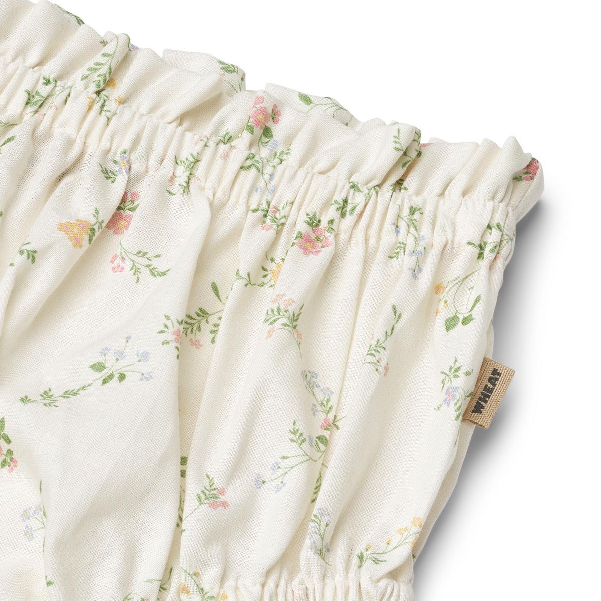Close up product image of woven cotton baby bloomer shorts