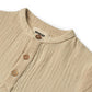 Close up product image of a woven relaxed fit baby shirt