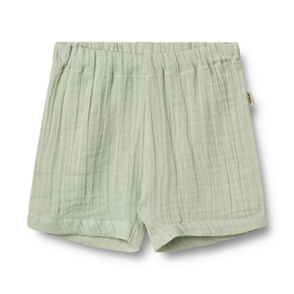 Flat front product image of woven relaxed fit baby shorts